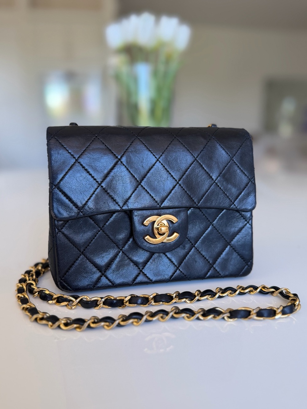 CHANEL Black Quilted Lambskin Leather Crossbody with 24K Gold turnlock Hardware
